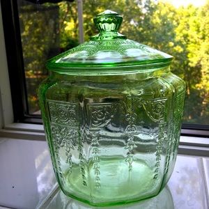 Vintage depression glass canister.